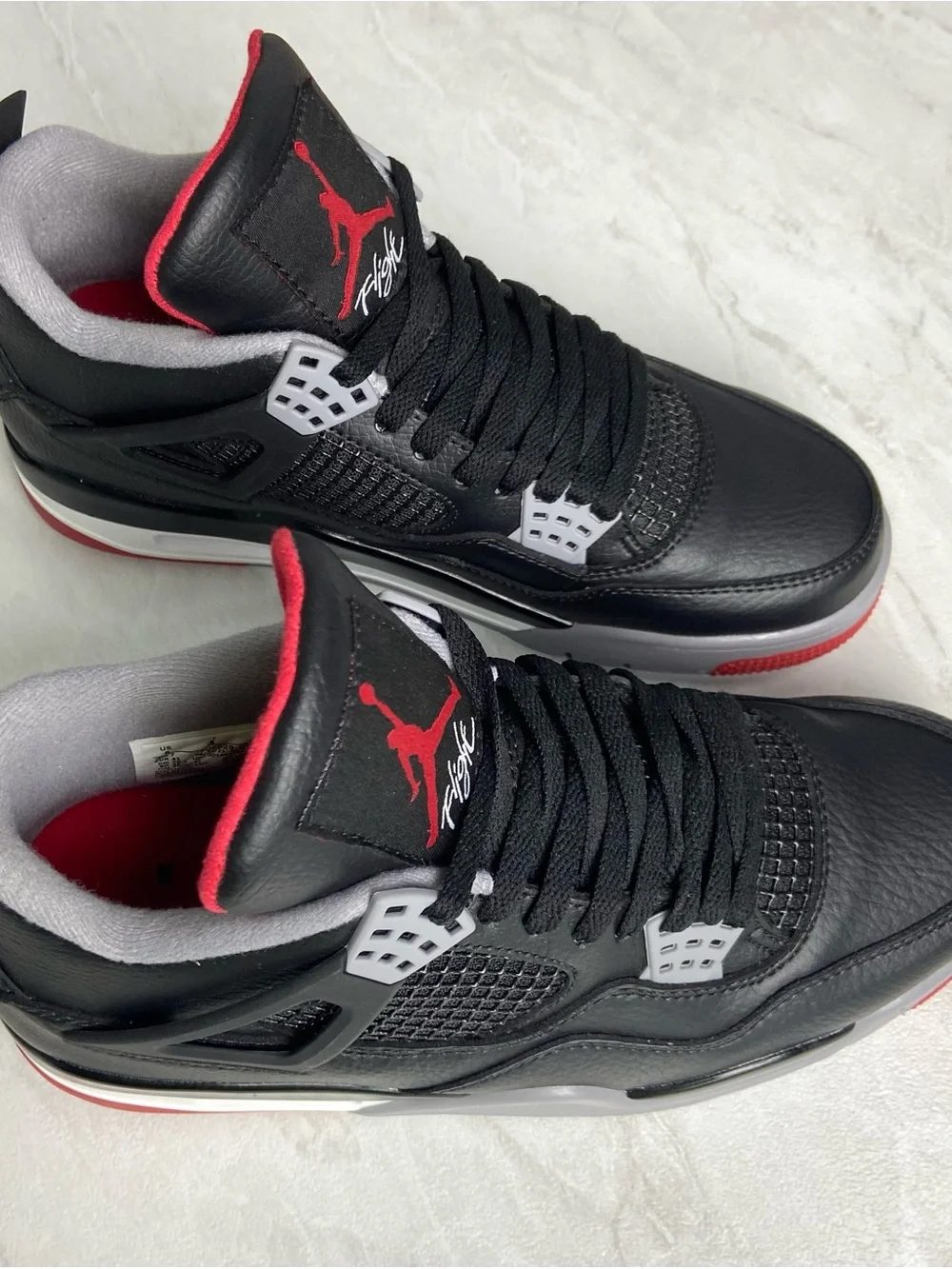 Jordan Black Sneakers with Red and Gray Accents